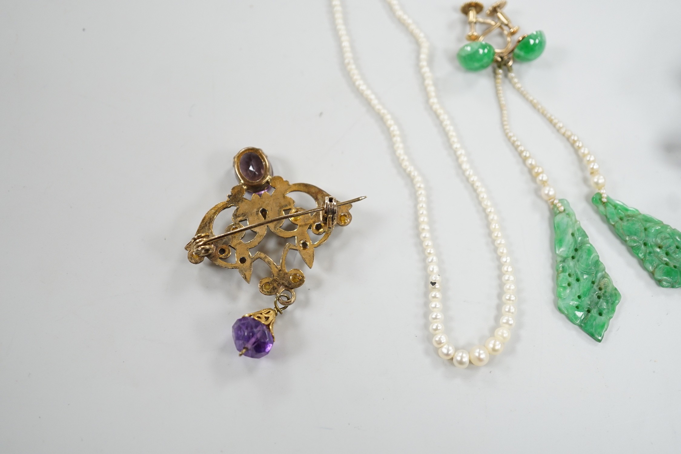 A pair of yellow metal, jade and seed pearl set drop earrings, 7cm, a seed pearl necklace with 9ct clasp, a belt section and a paste set brooch.